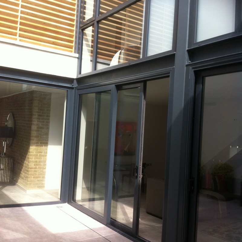 Anthracite aluminium sliding patio doors fitted in Leighton Buzzard
