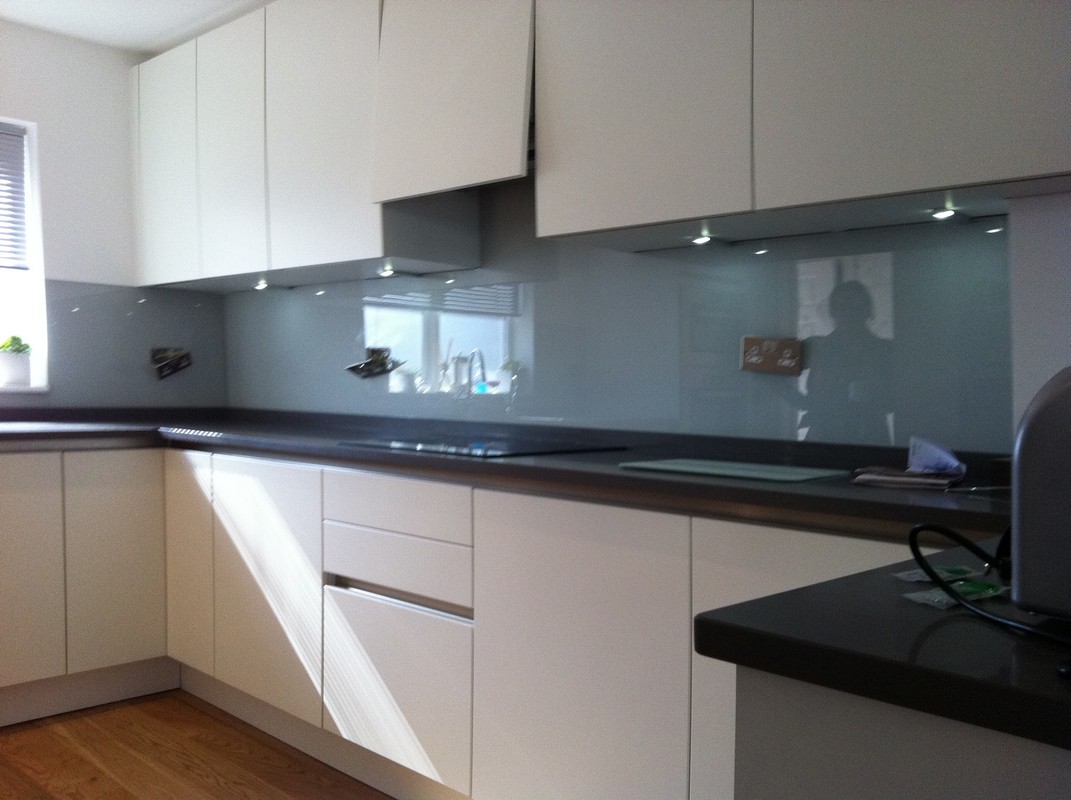 Grey glass kitchen splashback with LED lighting in Leighton Buzzard