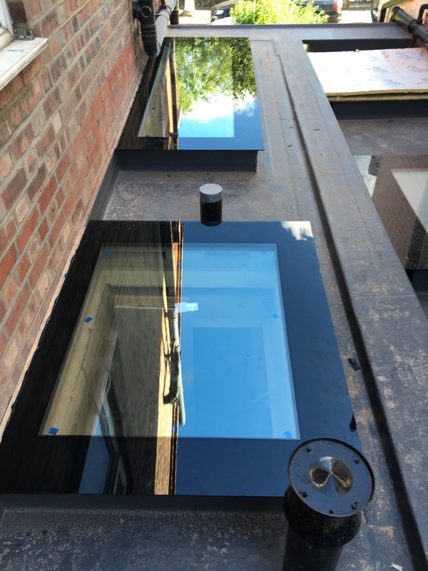 Multiple flat roof skylights on extension in Leighton Buzzard